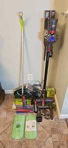 lot 197 image: Dyson Cordless Vacuum Cleaner with Attachments and Cleaning Pads - untested