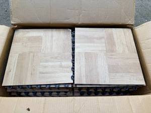 lot 228 image: Box of Interlocking Wood-Look Floor Tiles by Greatmats
