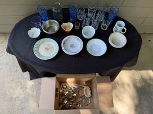 lot 234 image: Assorted Kitchenware Collection with Glassware, Bowls, Plates, and Flatware