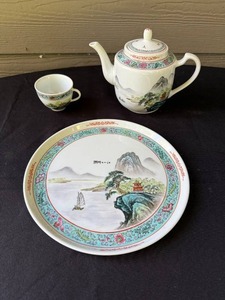 lot 241 image: Chinese Porcelain Teapot, Cup, and Plate Set with Scenic Artwork