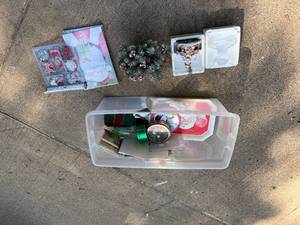 lot 254 image: Holiday Decor Lot with Tins, Serving Trays, Gift Tags, and Tabletop Arrangements