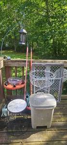 lot 288 image: Outdoor Patio Lot with Planters, Yard Tools, Bug Zapper, and Storage Bin