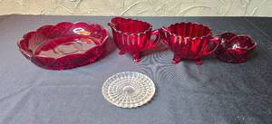 lot 336 image: Ruby Red Pressed Glass Creamer, Sugar Bowl, Serving Dish, and Clear Glass Coaster Set