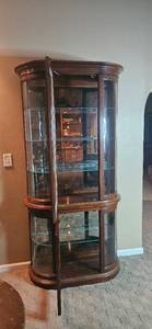 lot 344 image: Glass Curio Cabinet with Wood Frame and Mirrored Back, 76x36x15 Inches