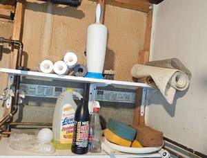 lot 354 image: Utility Shelf Lot with Cleaning Supplies, Brushes, Sponges, and Mat - content quantities unverified