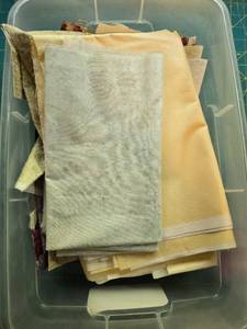 lot 381 image: Assorted Quilting Fabric Scraps and Pieces in Storage Bin
