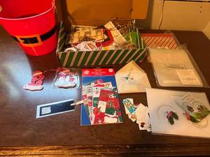lot 410 image: Large Holiday Gift Tag and Ornament Assortment with Santa Bucket