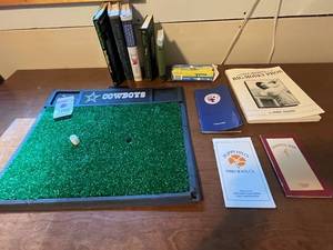 lot 415 image: Golf Enthusiast Lot W Book Collection & Dallas Cowboys Turf Tee Mat and Floating Golf Game