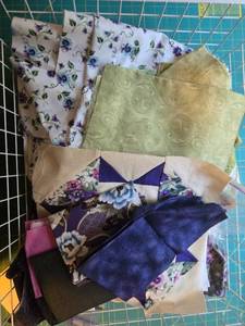 lot 427 image: Collection of Assorted Purple and Floral Quilting Fabric Pieces