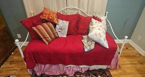 lot 465 image: White Metal Daybed Frame with Mattress, Bedding, and Assorted Pillows