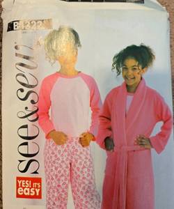 lot 491 image: Lot of Fleece Sewing Patterns and Various Fabrics