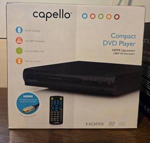 lot 502 image: Capello Compact DVD Player and Enpornk Flameless LED Candle Set