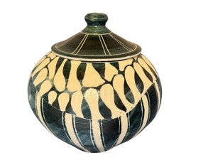 lot 23 image: Artisan Crafted Lidded Pottery Jar with Blue and Cream Design, 7 Inches Tall
