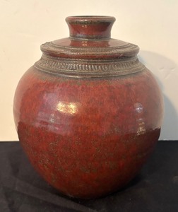 lot 49 image: Artisan Crafted Pottery Jar with Red Glaze