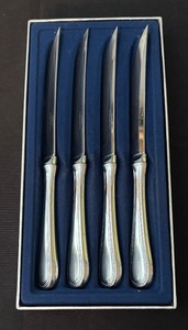 lot 106 image: Set of 4 Towle Stainless Steel Knives