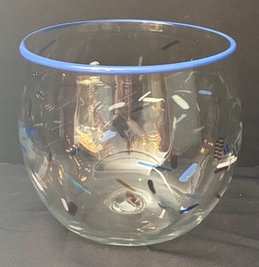 lot 124 image: Handcrafted Glass Bowl with Blue Rim and Color Accents