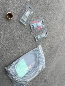 lot 446 image: Master Lock Products, Tailgate Cable Assemblies, and Metal Bushing