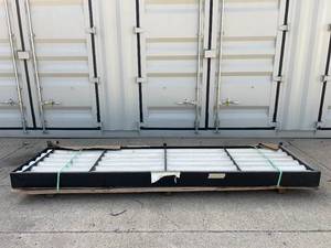 lot 521 image: Pipe Storage For Trucks
