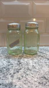lot 6 image: Pair of Vintage Ribbed Vaseline Glass Uranium Shakers with Metal Lids