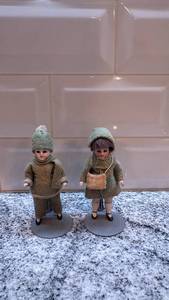 lot 10 image: Set of 2 Vintage 4-Inch Porcelain Dolls with Green Outfits on Stands