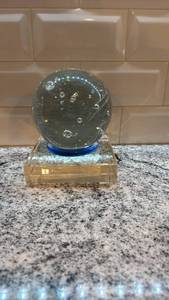 lot 59 image: Decorative Glass Orb with Bubble Inclusions and Display Stand
