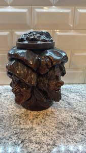 lot 69 image: Antique Carved Wooden Tobacco Jar with Multiple Faces Motif