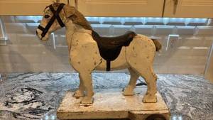 lot 110 image: Antique Wooden Pull Toy Horse on Wheels 19x21 Inch