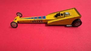 lot 171 image: Vintage Hot Wheels The Snake Dragster Yellow Diecast Car
