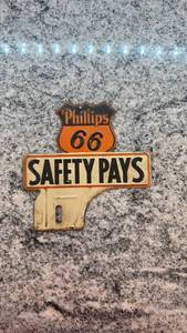 lot 211 image: Vintage Phillips 66 Safety Pays Metal Sign Badge