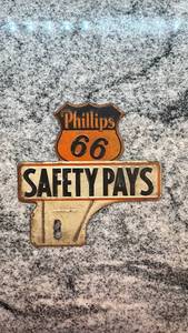 lot 213 image: Vintage Phillips 66 Safety Pays Metal License Plate Topper