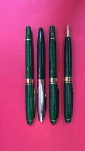 lot 229 image: Set of 4 Green Marbled Writing Pens with Gold Trim