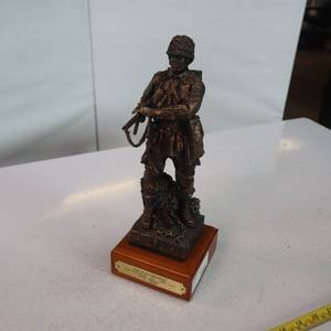 lot 104 image: Friends of the NRA brass  Paratrooper