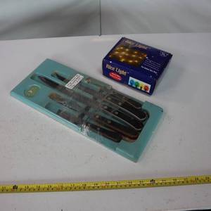 lot 112 image: Knife set and string o lights.