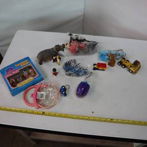 lot 199 image: Unique set of playful dolls and figurines
