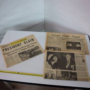 lot 204 image: Kennedy has been Slain  Newspaper editions of reporting in local papers
