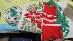 lot 46 image: 2- Vintage Christmas Tablecloths and 12-Vintage Hand Painted Dessert Christmas Plates