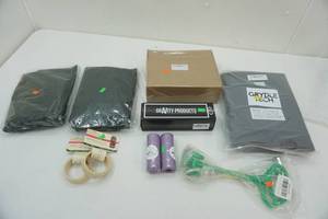lot 141 image: Sprinkler, Organizing Cubes, Silicone Griddle, Cutting Tool, Wooden Bracelets