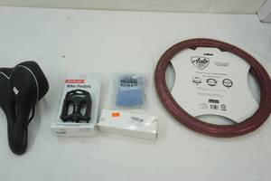 lot 150 image: Steering Wheel Cover, Bike Seat, Pedals, bike tool kit, ball air pump