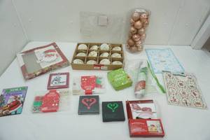 lot 165 image: Christmas Ornaments, Window Clings, Bracelet Making Kits, Gift Bags Card Games and more