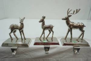 lot 168 image: 3ct Metal Stocking Hangers. Buck & Fawns