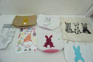 lot 239 image: Easter Gnome Window Clings, Bunnie Bags, Coloring Tablecloth