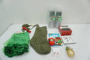 lot 275 image: (60ct) Plastic Part Glasses and Other Holiday Decor