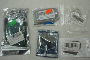 lot 352 image: Cadillac & KIA Key Chains () Application Unknown