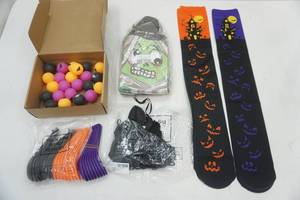 lot 383 image: Halloween Lot Ping Pong Ball Carry Games, Treat Bags, Pirate Patches, Socks