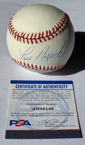 lot 18 image: Lou Brock Signed Baseball With PSA COA Rawlings Official League Ball With Case