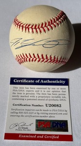 lot 31 image: Ivan Pudge Rodriguez Signed Basebal With PSADNA COA Rwalings OALB Budig Ball With Case