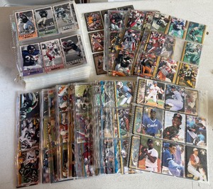 lot 145 image: Large Box Unsorted Binder Sheets - Baseball and Football Cards