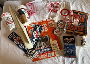 lot 156B image: Minnesota Twins Vintage World Series Collection 1987  1991 - Wheaties Box, Cups, Mug, Bumper Stickers, VHS, Schedule, Program, Posters, Homer Hankies