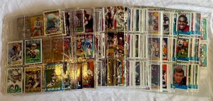 lot 97B image: Large Lot of 1980s-1990s Football Cards in Binder Sheets - Not Picked Through, Includes Stars