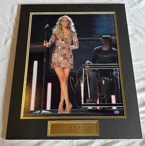 lot 8B image: Carrie Underwood Signed Photo With COA Matted 20x24